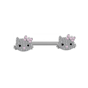 Macro detail of cat head nipple ring with sparkling crystals and polished steel bar