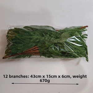 Detail shot of 12 real-touch Norfolk pine branches with 43cm size dimensions and weight info