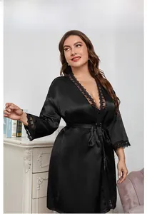 Close-up of elegant black satin robe with intricate eyelash lace trim on sleeves