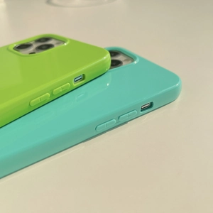 Neon jelly silicone phone cases for iPhone in vibrant lime green and ocean blue colors