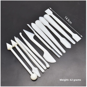 Detailed 14-piece white plastic sculpting tool set for clay and fondant decorating