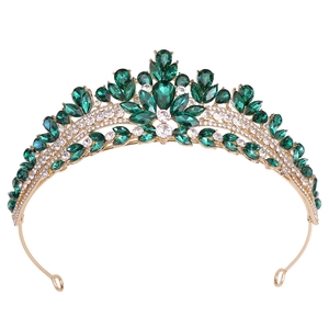 Elegant gold bridal tiara with emerald green crystals and sparkling rhinestones for weddings