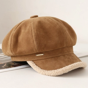 Vintage brown suede newsboy cap with beige faux fur trim and gold metal logo detail