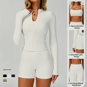 Three-piece ribbed yoga set including zip jacket, sports bra, and high-waist shorts in white