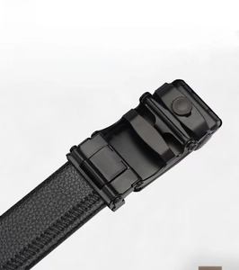 Detail shot of black litchi pattern leather belt with magnetic matte metal buckle