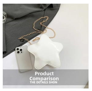 Mini star-shaped white crossbody bag with gold chain strap shown with a phone for scale