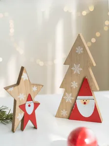 Detailed view of wooden Christmas tree and star ornaments with Santa Claus motifs