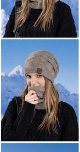 Close-up of winter knitted beanie and neck warmer set with fleece lining in outdoor snow