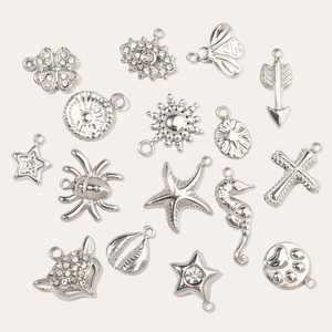 Assorted silver stainless steel charms including starfish and crosses for DIY jewelry