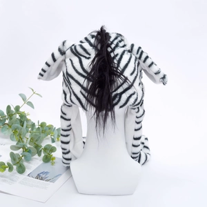 Detail view of the zebra pattern plush hat showing the black mane and soft faux fur fabric