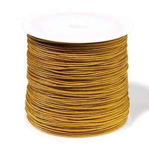 Gouden 0,8 mm nylon koord op witte spoel voor DIY sieraden en handmatig weven