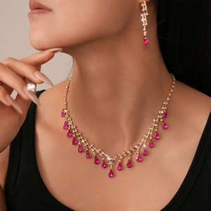 Elegant 2-piece jewelry set featuring pink teardrop stones and sparkling rhinestones