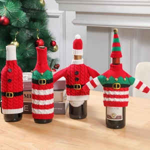 Festive knitted Christmas wine bottle covers with classic red and green sweater designs