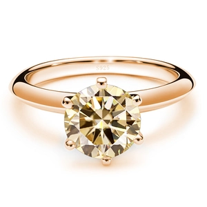 Detailed macro shot of the S925 sterling silver stamp on a rose gold six-prong ring