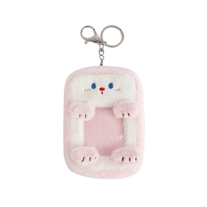 Pink and white plush cartoon animal photocard holder with a durable metal lobster clasp