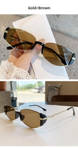 Dettaglio degli occhiali da sole in metallo dorato con eleganti lenti marrone scuro