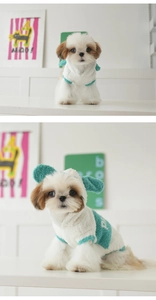 Detail of teal and white plush dog hoodie with cute 3D ears for winter warmth