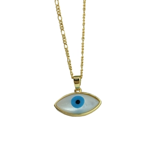 Golden Figaro chain necklace with oval mother of pearl evil eye pendant on white background