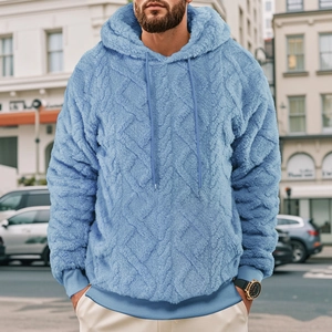 Close-up of light blue men's fleece hoodie with plush texture and adjustable drawstring