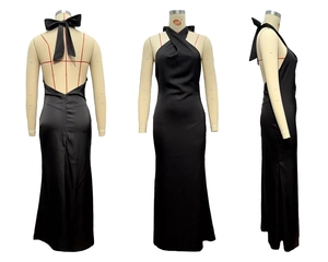 Dettagli dell'elegante abito da sera nero in raso con scollo all'americana e fiocco sul retro