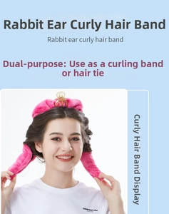 Detail of pink plush bunny ear heatless hair curler with amber claw clip on model