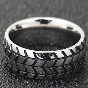 Men's stainless steel tire tread ring with industrial silver and black contrast finish