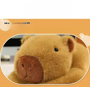 Close-up of soft brown capybara plush toy featuring detailed embroidery and fluffy texture