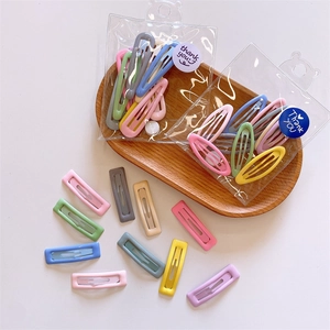 10-piece pack of mini candy-colored rectangular BB hair clips for girls in a gift bag