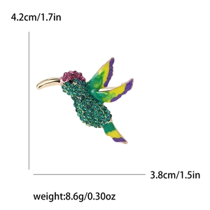 Detailed size and weight specs of hummingbird brooch with green rhinestones and enamel