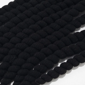 Jamaica beanie hat featuring black bubble textured knit fabric with dreadlock braids detail