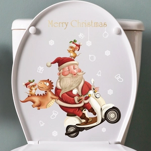 Santa Claus on scooter toilet lid sticker with Merry Christmas text and snowflakes