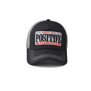 Detail of 3D embroidery patch with ALWAYS KEEP POSITIVE text on mesh baseball cap