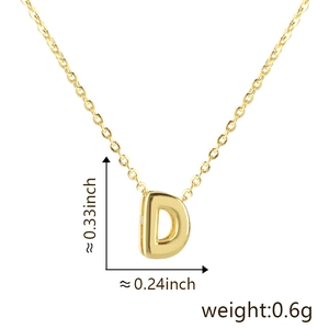 Detailed view of gold letter D pendant with measurements 0.33 by 0.24 inch and 0.6g weight