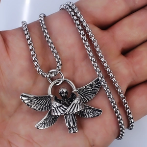 Retro six-winged seraph angel pendant necklace in silver metal finish held by hand
