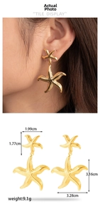 Detail of layered gold starfish earrings with textured surface and size specifications