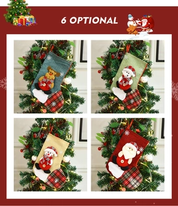 Detail of Christmas stockings with 3D cartoon Santa, reindeer, and plaid cuffs