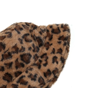 Close-up of leopard print faux fur texture on a warm winter bucket hat for women