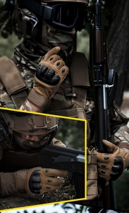 Tactical gloves with hard shell knuckle protection in outdoor combat field scenarios