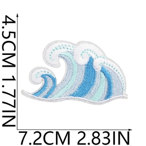 Detail view of blue ocean wave embroidered patch with dimensions 7.2cm by 4.5cm