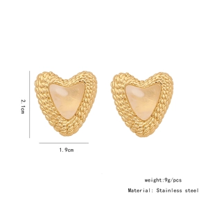 Detail view of heart-shaped gold earrings with dimensions 2.1cm by 1.9cm and weight 9g