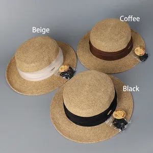 Chapeaux de soleil en paille à sommet plat pour femmes en beige, café et noir