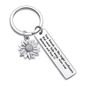 Friendship keychain with sunflower charm and engraved stainless steel quote tag
