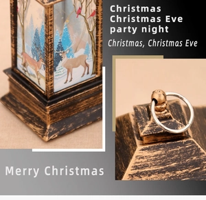 Detail of Christmas lantern top ring and reindeer forest illustration on bronze frame