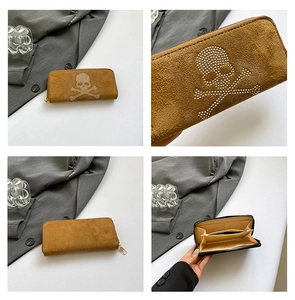 Brown skull long wallet with multi-card slots and zippered coin pouch detail view