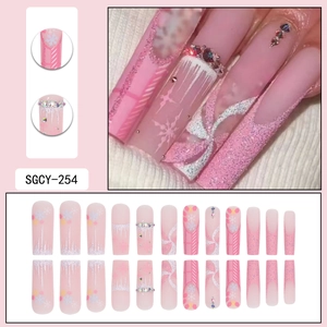 Pink Christmas press-on nails with snowflakes and 3D bow design 24-piece full set