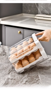 Detail view of double-layer transparent egg storage box with anti-slip wave tray design