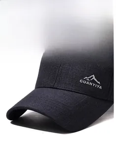 Detail of tear-resistant gray fabric and reinforced stitching on a mountain baseball cap