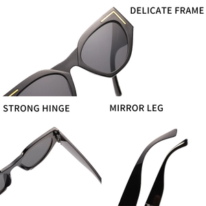 Detail of oversized cat-eye sunglasses featuring delicate frames and strong metal hinges