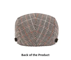 Rear view of British style plaid newsboy cap with black leather trim and metal buckle
