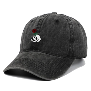Vintage washed denim baseball cap with skull and red rose embroidery in distressed black